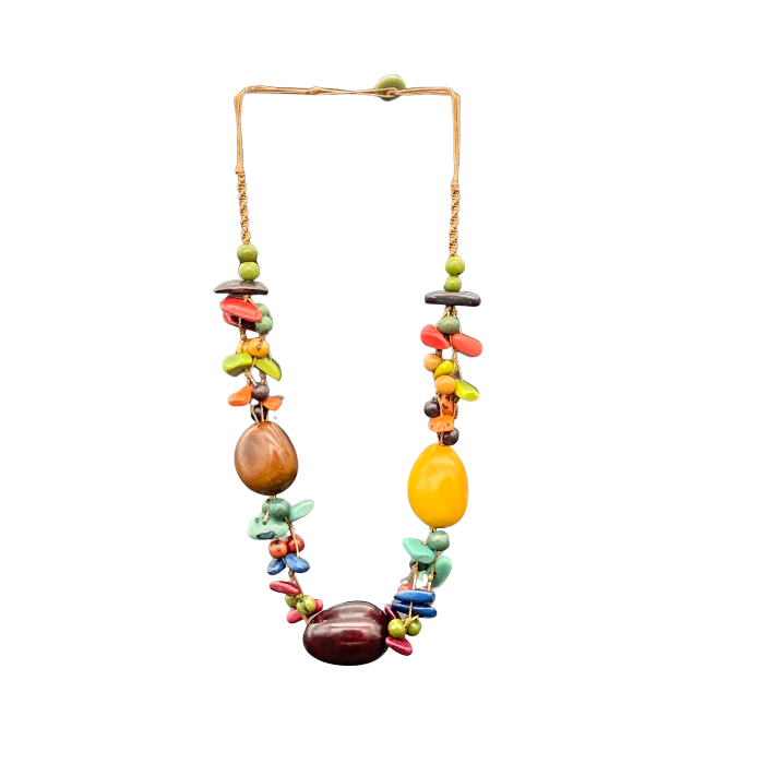 Non-adjustable necklace. Length 12"-13". The Killari necklace features 3 whole tagua nuts surrounded by small chunky pieces of tagua in complimentary colors