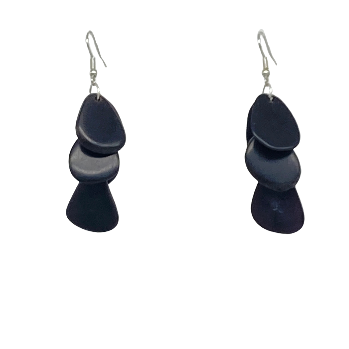 Zoe earrings composed of cascading slices of Tagua nut
