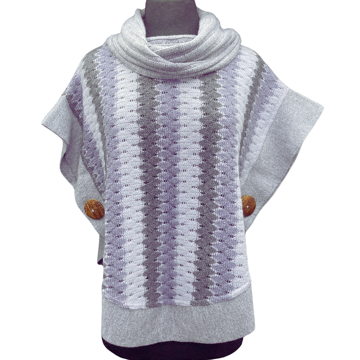 Sweater with vertical stripes of grey, light and dark lavender.Coconut buttons adorn either side at waist.