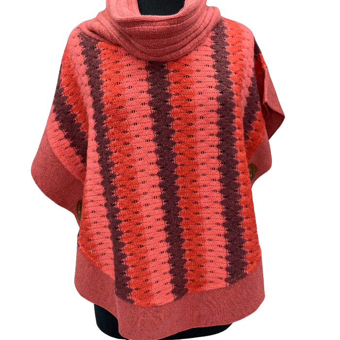 Sweater with vertical stripes of grey, light and dark coral.Coconut buttons adorn either side at waist.