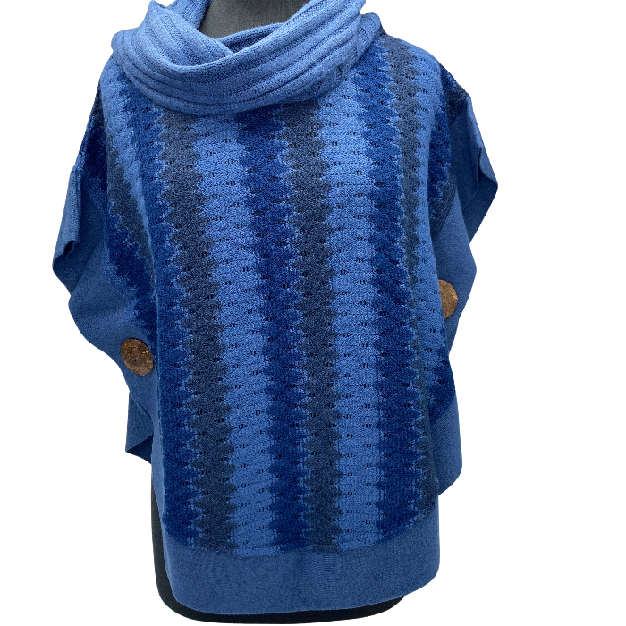 Sweater with vertical stripes of grey, light and dark blue.Coconut buttons adorn either side at waist.