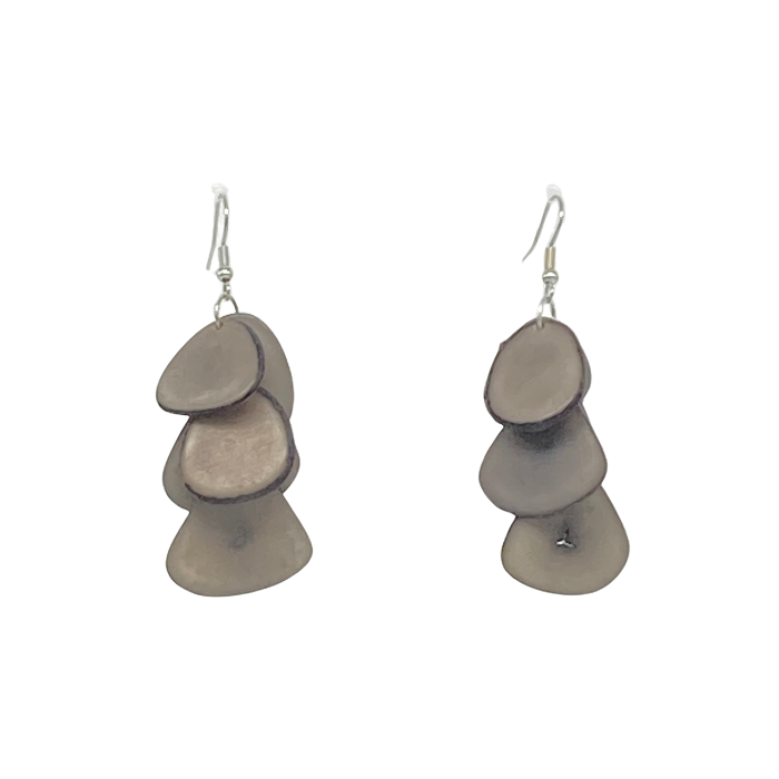 Zoe earrings composed of cascading slices of Tagua nut