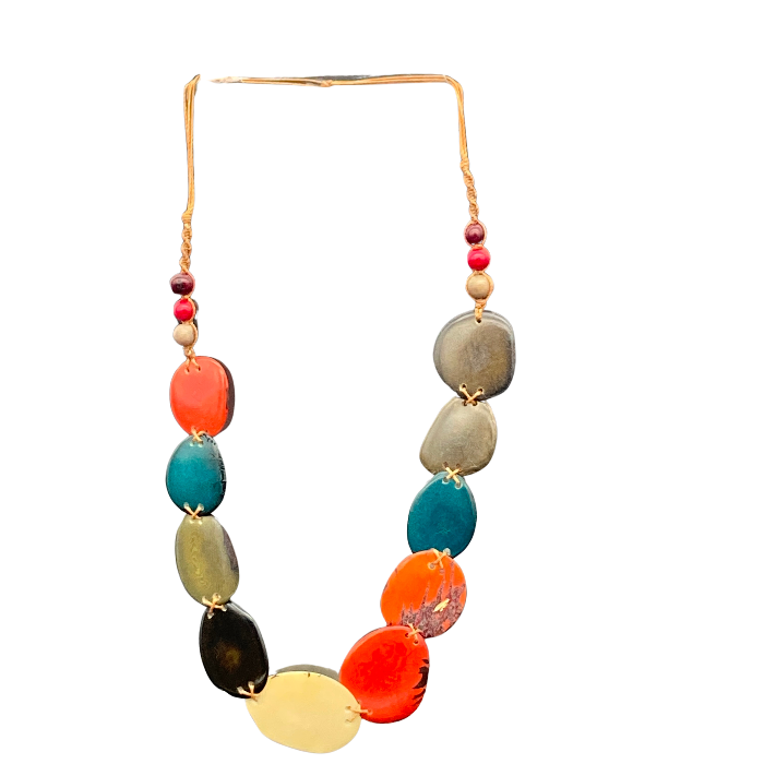 Thin "slices" of Tagua nut in multi color non-adjustable, with button closure. Length 12" approximately.