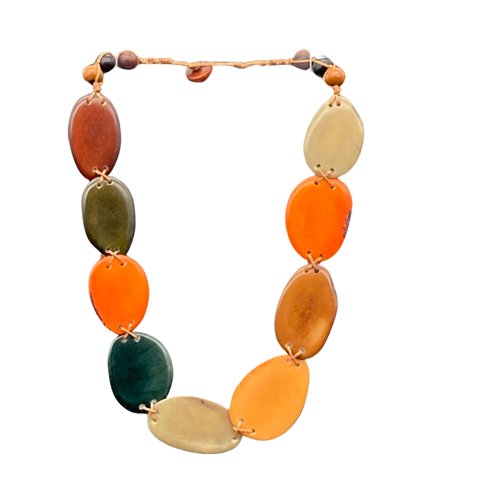 Thin "slices" of Tagua nut in multi color non-adjustable, with button closure. Length 12" approximately.