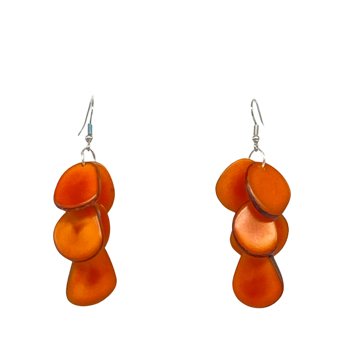 Zoe earrings composed of cascading slices of Tagua nut