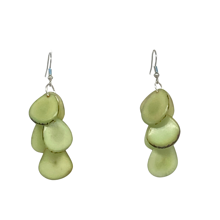 Zoe earrings composed of cascading slices of Tagua nut