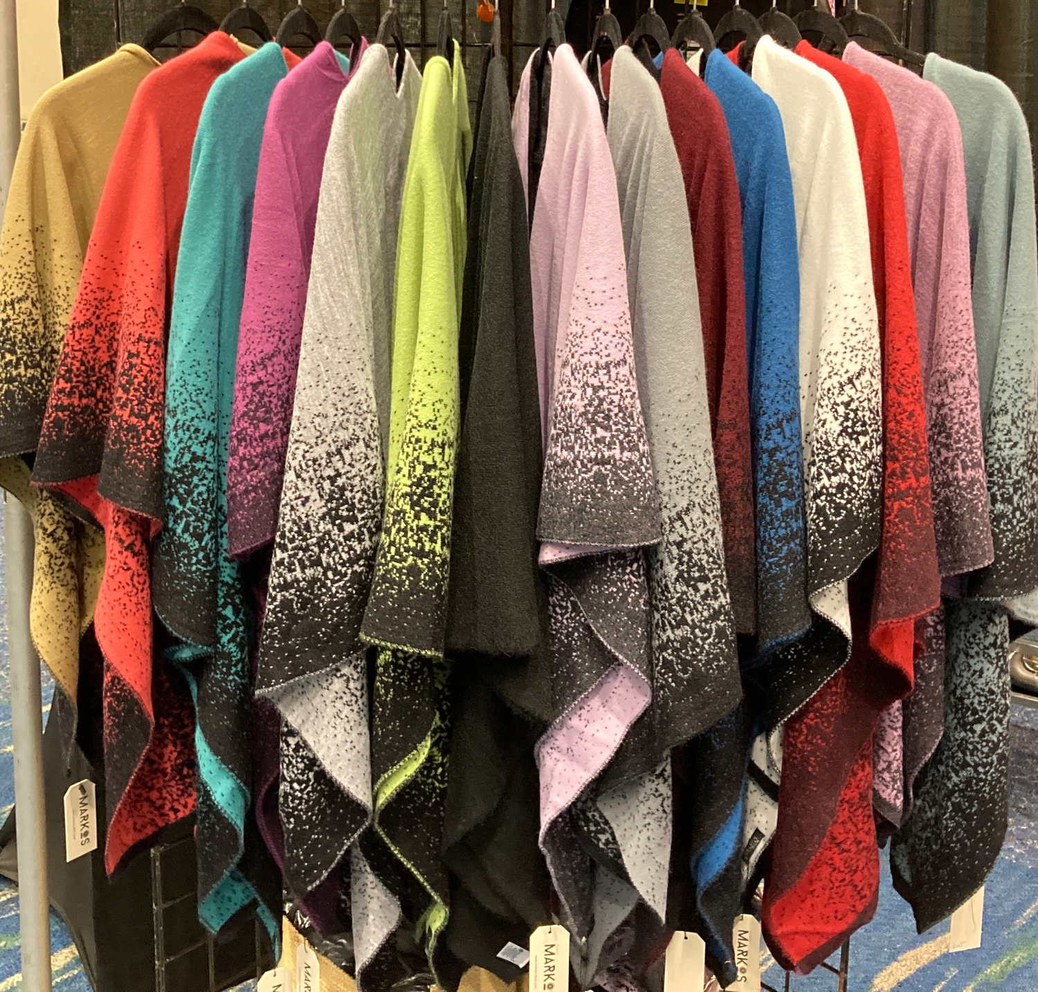 Some of favorite customers sporting both the easy to wear sweater poncho as well as the versatile reversible wrap. some of the girls have embellished their look with a matching Tagua nut necklace!