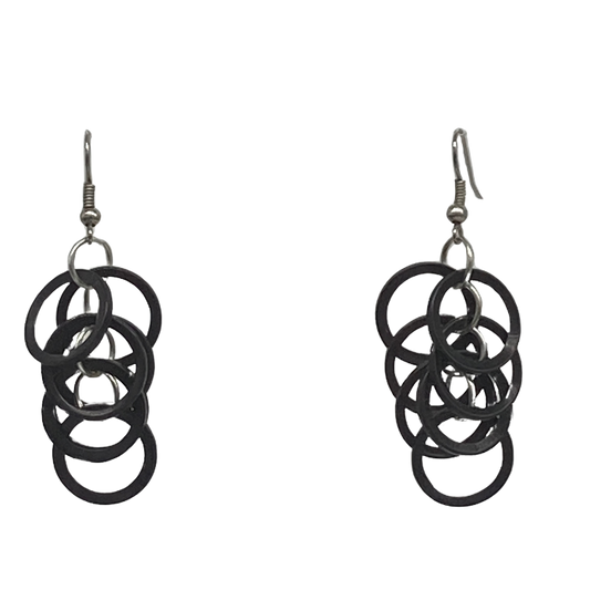 Seven small rings (each the size of a dime), dangling, length approx. 2"-2 1/2"