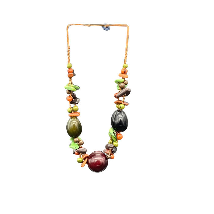 Non-adjustable necklace. Length 12"-13". The Killari necklace features 3 whole tagua nuts surrounded by small chunky pieces of tagua in complimentary colors