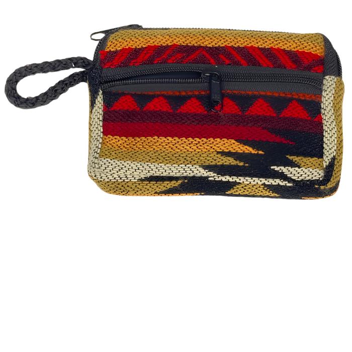 Change  purse with 2 zippered compartments, one big enough for credit cards, one for
 money, all woven cloth with indigenous design.