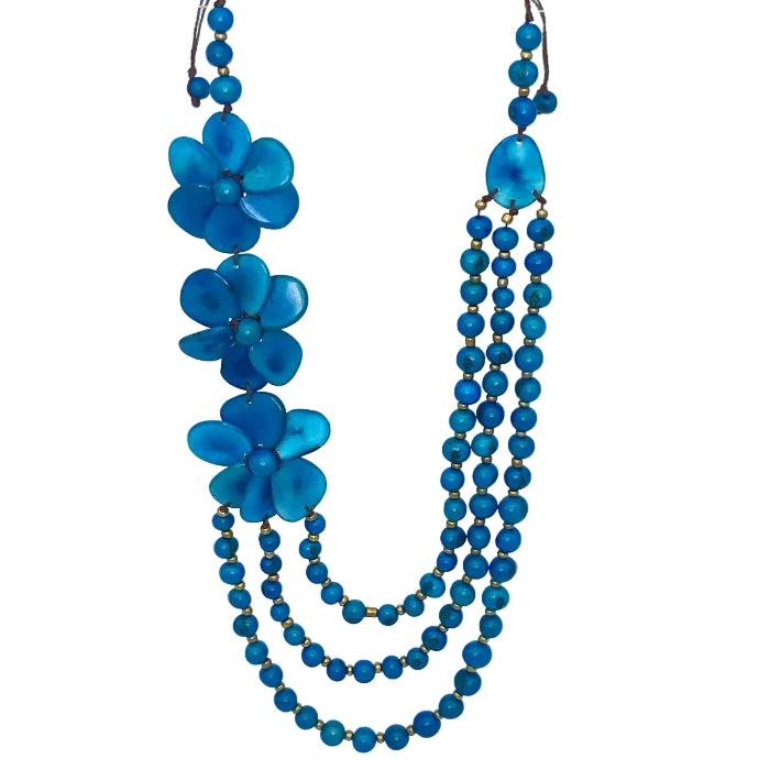 Blue beaded necklace on a mannequin bust against a white background