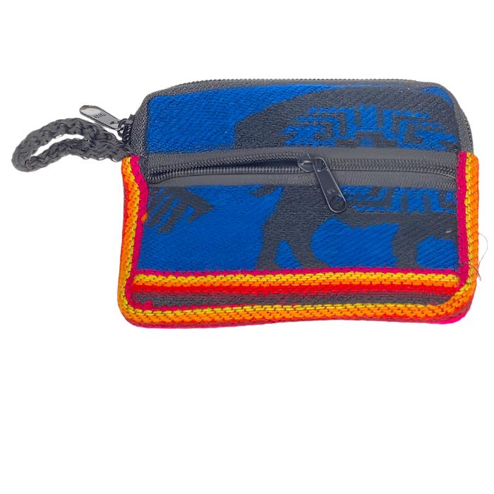 Change  purse with 2 zippered compartments, one big enough for credit cards, one for
 money, all woven cloth with indigenous design.