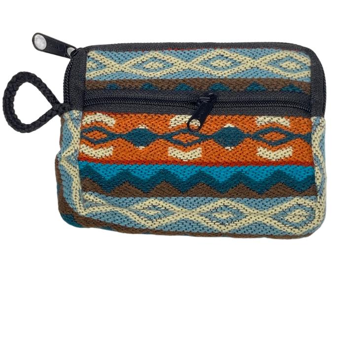 Change  purse with 2 zippered compartments, one big enough for credit cards, one for
 money, all woven cloth with indigenous design.