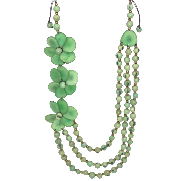 Green floral necklace with multiple strands on a white background