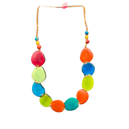 Thin "slices" of Tagua nut in multi color non-adjustable, with button closure. Length 12" approximately.